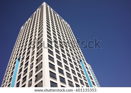 Residential Building on Sky Background, Apartment Building Exterior, Apartment Complex with Windows, Building Face, Highrise Buildings,  Square Background, Urban Housing