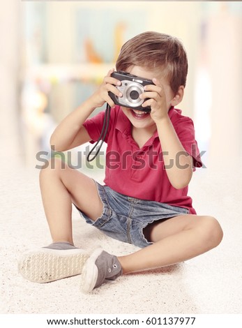 Boy taking a picture