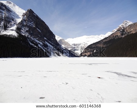Wide angle view of Frozen Lake Louise, Victoria Glacier & Mountain Fairview in Alberta, Canada, Banff (Banff National Park)