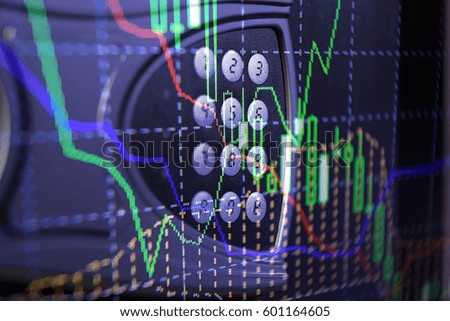 Charts of financial instruments with various type of indicators including volume analysis for professional technical analysis on the monitor of a computer. Fundamental and technical analysis concept
