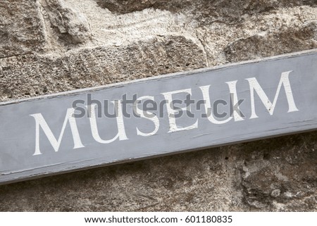 Closeup of Museum Sign on Diagonal Slant