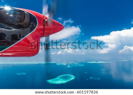 Landscape seascape aerial view over Maldives Male Atoll sandbank island. Flying blue sky clouds amazing view paradise island background concept website template