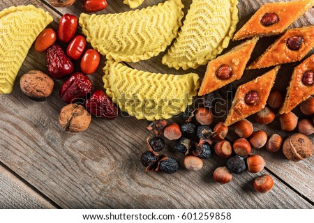 Eastern sweets to Novruz holiday on wooden background