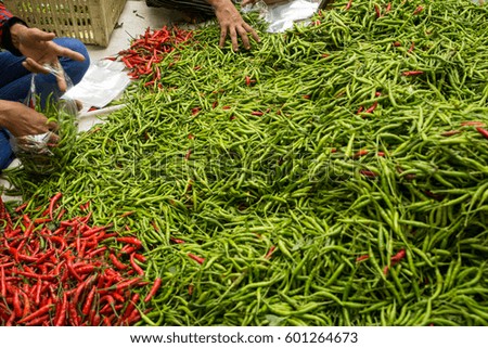 Mountain of chili pepper in market