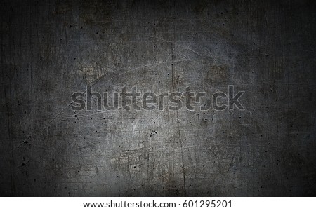 Grey grunge metal textured wall background Royalty-Free Stock Photo #601295201