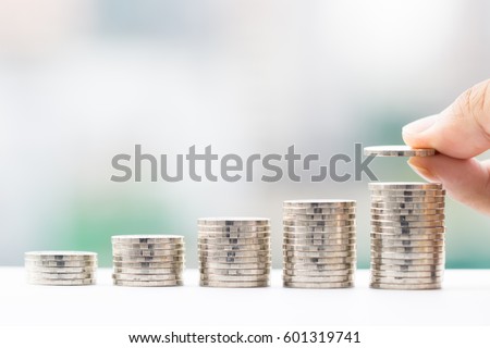 Money, Financial, Business Growth concept, Man's hand put money coins to stack of coins