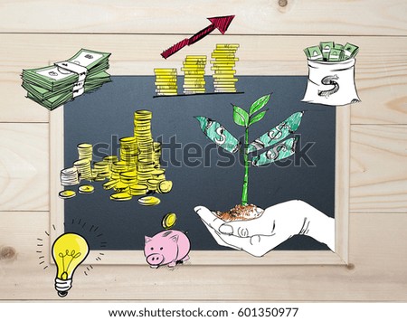 Top view blackboard .Draw prepare money for future investment . Top board on wood background.