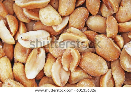 Peeled peanuts background food photography in studio. Close up macro peanuts photo. Beautiful salted roasted peanuts pattern concept.