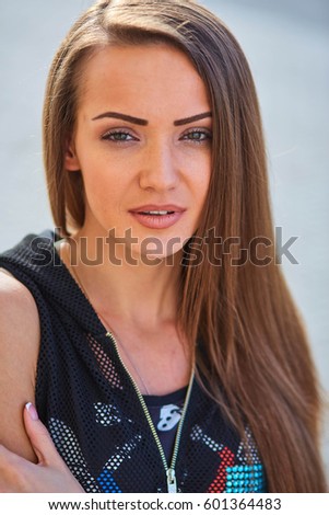 picture of a girl with long hair on the street