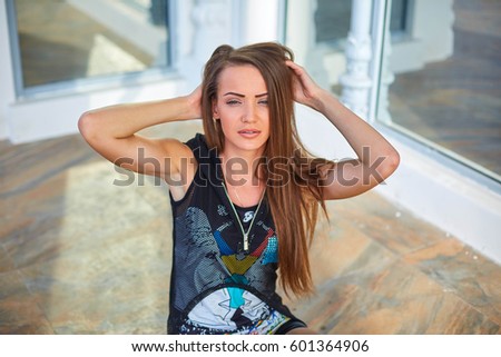 picture of a girl with long hair on the street