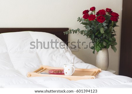 healthy food, breakfast in a bed, mobile phone, coffee 