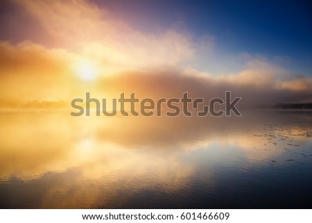 Vivid view of the foggy pond in twilight. Dramatic and gorgeous morning scene. Location place Ternopil, Ukraine, Europe. Discover the world of beauty. Glowing filter. Artistic picture. Vintage effect.