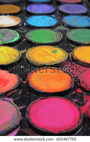 Watercolor used paint palette. Used palette can illustrate creative art work or any other concept.