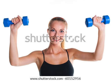 smiling young girl doing fitness exercises