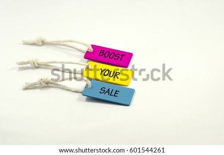 boost your sale word on colorful wooden tag isolated on white background