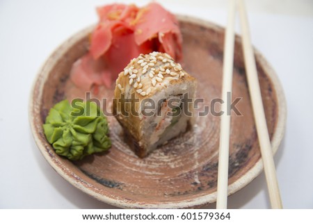 Japanese traditional foods rolls and sushi. Delivery of Japanese food from a Japanese restaurant.