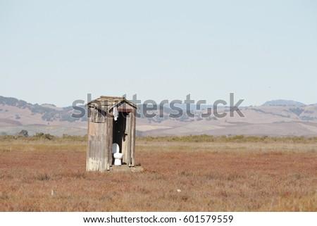 Hunter's Outdoor Bathroom Outhouse in Nature