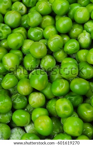 Frozen pea peas texture background. Green peas background pattern.