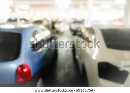 Picture blurred for background abstract and can be illustration to article of Cars parked in the parking lot
