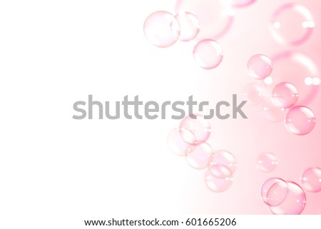 Beautiful pink soap bubbles float background.