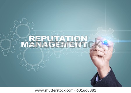 Businessman drawing on virtual screen. reputation management concept.