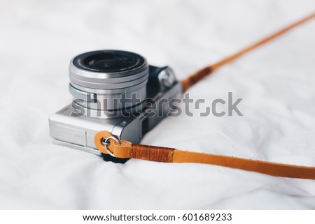 Genuine leather camera strap handmade on white background