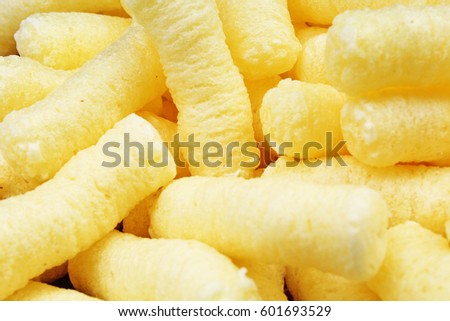 
Cheese puff. Cheese puffs snack background texture food pattern.