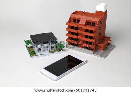 miniature models of residence and smart phone
