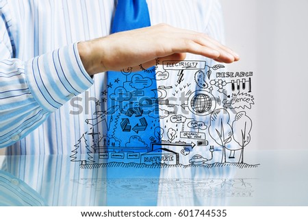 Businessman hand protecting business idea sketch with palms