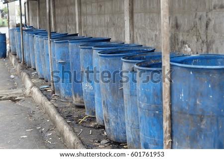 Blue bins lined up in that place.