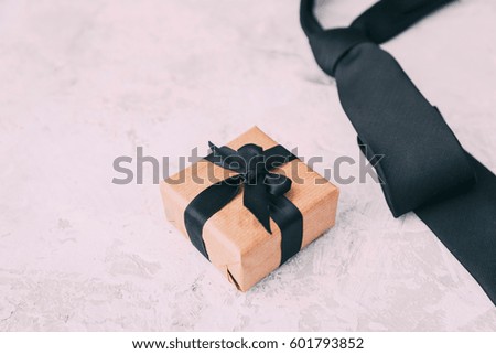 Happy Fathers Day background with gift boxes and tie