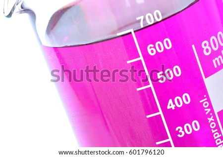Detail of the chemical containers with purple, pink potassium permanganate isolated on white background