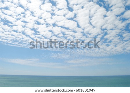 blue sea and clouds on sky