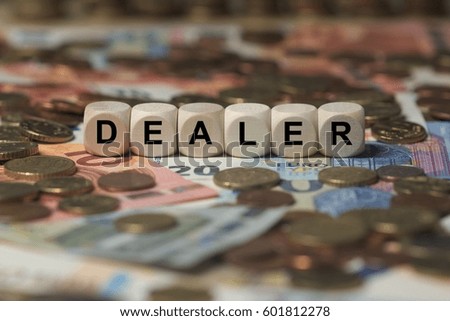 dealer - cube with letters, sign with wooden cubes