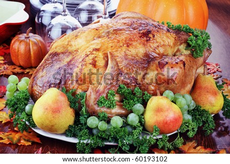 Thanksgiving turkey with fresh pears and grapes.