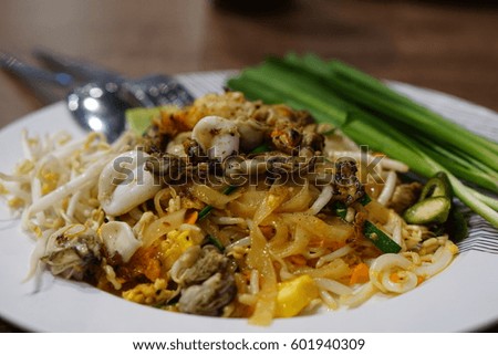 Thai food. Stir-fried thai noodles. Called Pad Thai.
In this picture is sea food thai noodles.