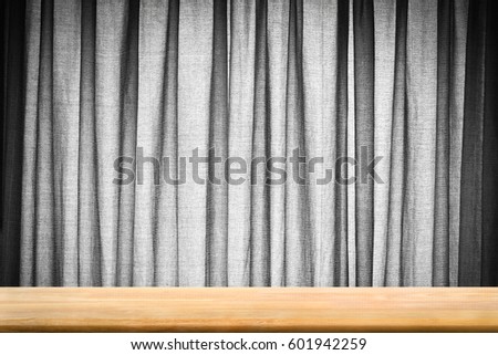 Abstract Natural wood table with grey curtain background : Top view of plank wood for graphic stand product, interior design or montage display your product