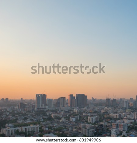 cityscape at sunset, building blurred lights background, city scape defocused