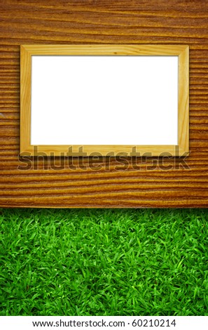 Frame on wood an grass for for background and text