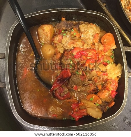 Vegetable stew. Hot foodstuff. Top view photo.