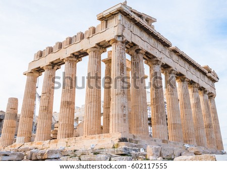 Parthenon on Acropolis hill in Athens, Greece side view with massive columns and sunset light selective focus