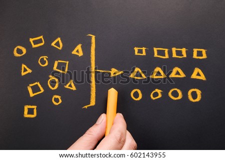 Hand drawing geometry to categorize on chalkboard Royalty-Free Stock Photo #602143955
