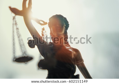 The Statue of Justice - lady justice or Iustitia / Justitia the Roman goddess of Justice Royalty-Free Stock Photo #602151149