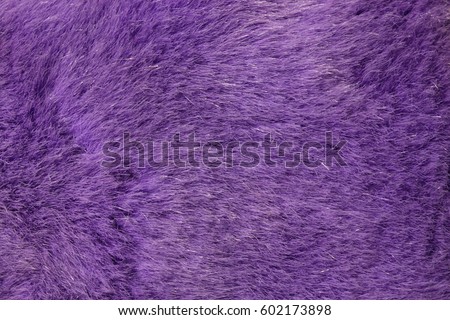 Very peri Purple artificial fur texture. Faux fur closeup Royalty-Free Stock Photo #602173898