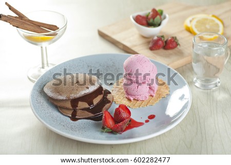 Chocolate Pancake With Double Scoop Strawberry Ice Cream