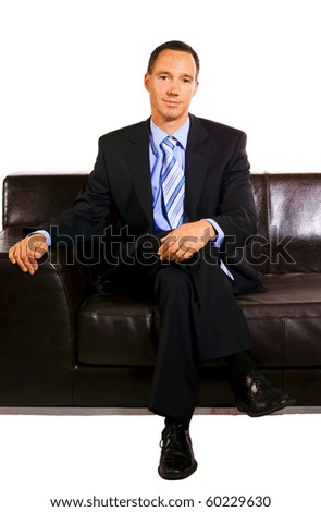 Young business man portrait over white background