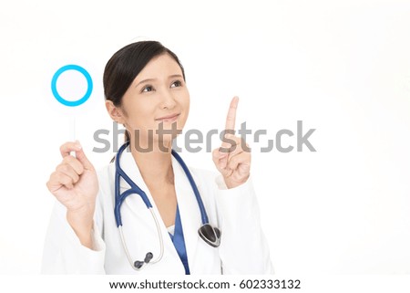 Asian medical doctor with a Yes sign