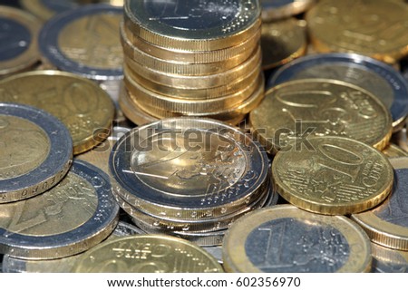 Stacks of Euro coins of different denominations