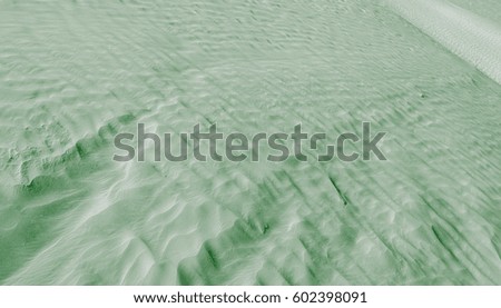 Dark green color of desert surface. Background and Texture