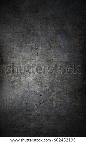 Grey grunge metal textured wall background Royalty-Free Stock Photo #602452193